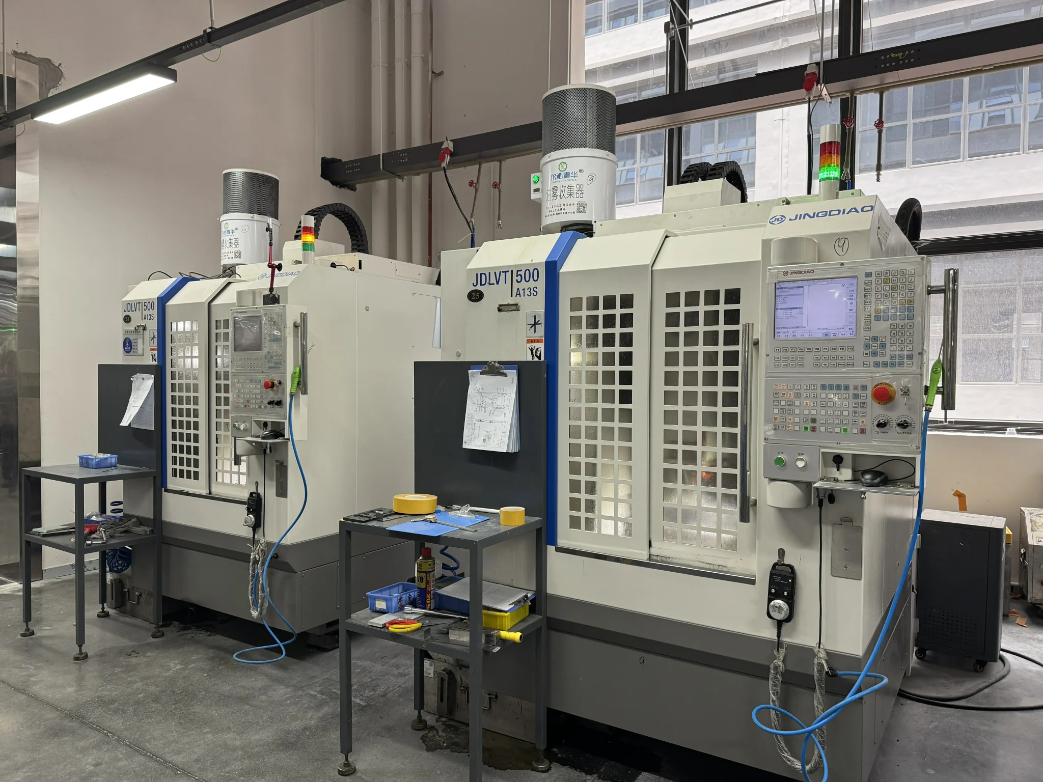 High-speed 5-axis CNC milling machines with oil mist collectors for ultra-precision tight tolerance metal component manufacturing